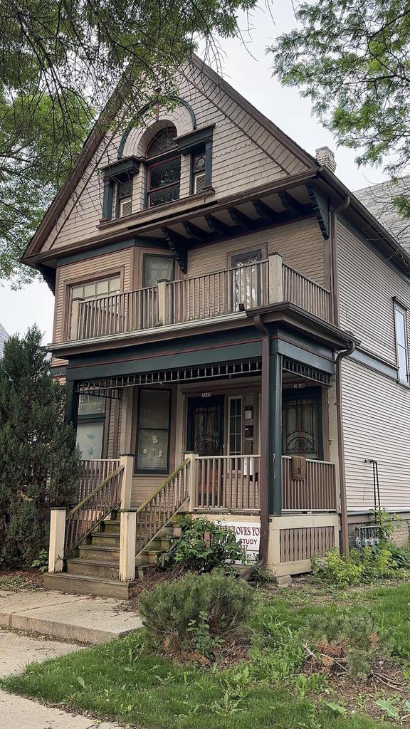 2343 N Palmer St Unit 2351, Milwaukee, WI 53212 - victorian home with a balcony, a porch, and a chimney