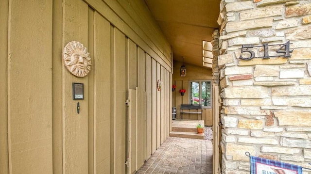 514 Fairfield Ct, Chippewa Falls, WI 54729 - property entrance featuring stone siding