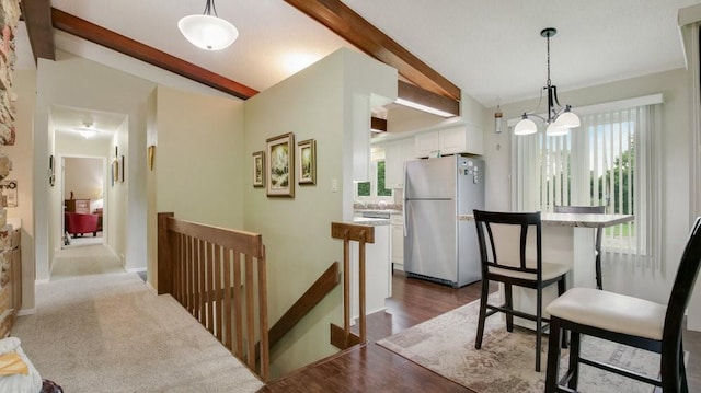 514 Fairfield Ct, Chippewa Falls, WI 54729 - dining area with plenty of natural light, a chandelier, and dark wood finished floors