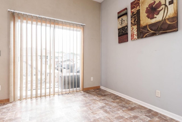 850 E Mckearn Ln, Beloit, WI 53511 - spare room with stone finish floors and baseboards