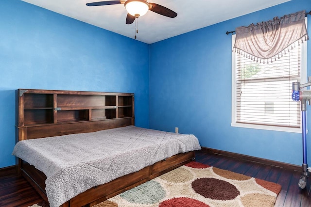 850 E Mckearn Ln, Beloit, WI 53511 - bedroom featuring wood finished floors, multiple windows, and a ceiling fan