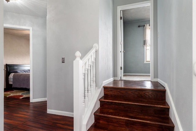 850 E Mckearn Ln, Beloit, WI 53511 - stairway featuring wood finished floors and baseboards
