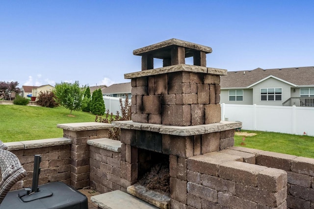 850 E Mckearn Ln, Beloit, WI 53511 - view of patio featuring an outdoor stone fireplace