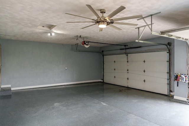 850 E Mckearn Ln, Beloit, WI 53511 - garage with baseboards and a garage door opener