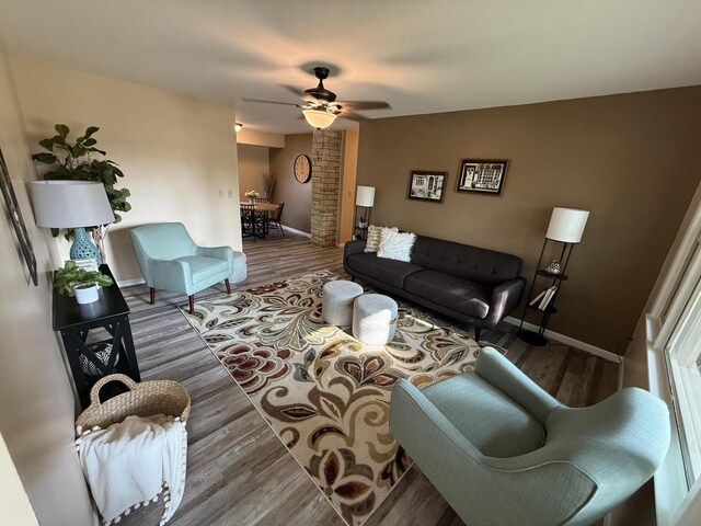 7140 N 48th St, Milwaukee, WI 53223 - living area featuring wood finished floors and ceiling fan
