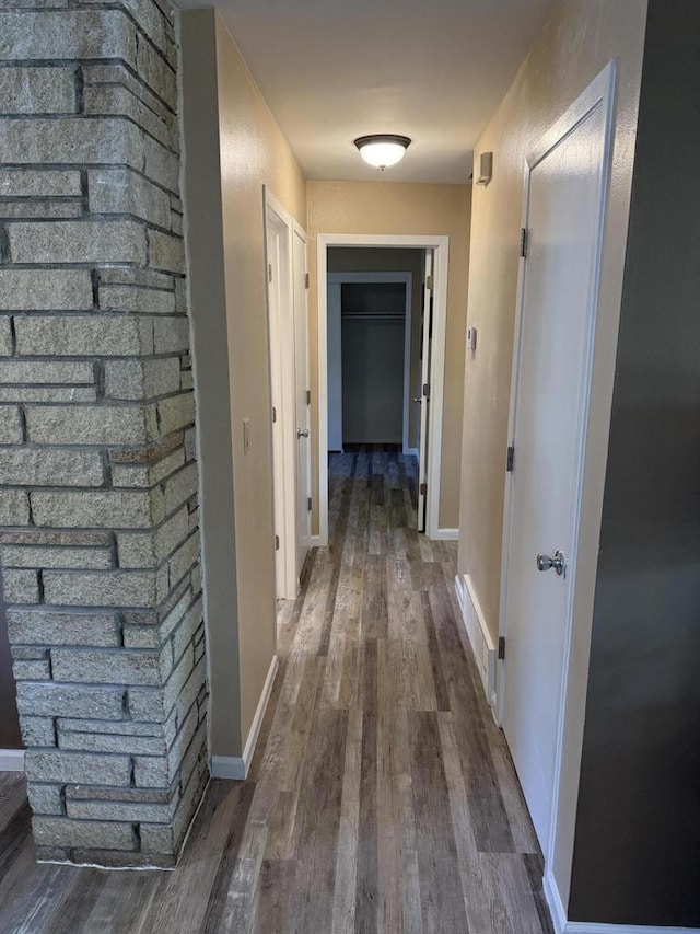 7140 N 48th St, Milwaukee, WI 53223 - hallway with dark wood-type flooring and baseboards