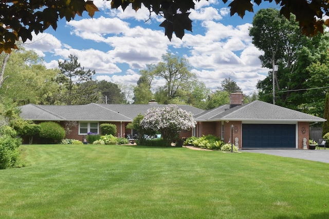 4729 James Ave, Wind Point, WI 53402 - ranch-style home with a garage, brick siding, a chimney, a front lawn, and driveway