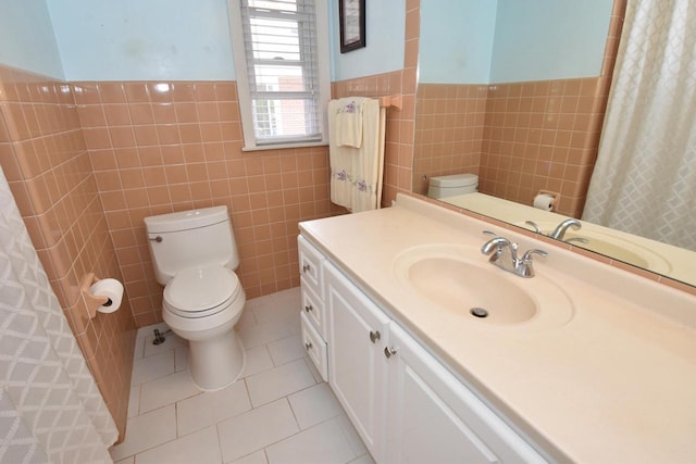 4729 James Ave, Wind Point, WI 53402 - bathroom with tile walls, vanity, tile patterned flooring, and a wainscoted wall