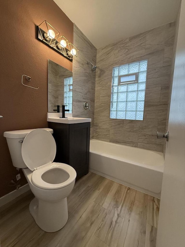 5411 N 37th St, Milwaukee, WI 53209 - full bath with  shower combination, vanity, and wood finished floors