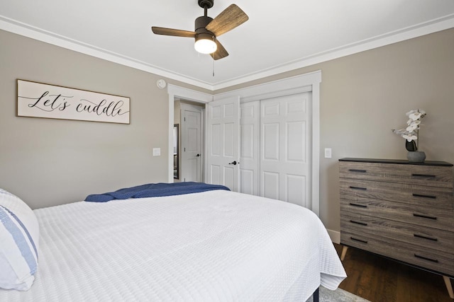 N2444 Howard Dr, Burlington, WI 53105 - bedroom with dark wood-style floors, a closet, crown molding, and a ceiling fan