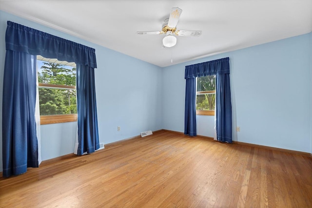 6500 S 121st St, Franklin, WI 53132 - empty room with light wood-style flooring and a ceiling fan