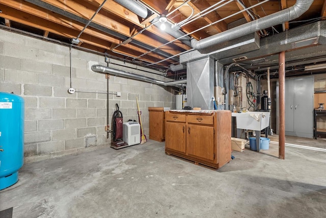 6500 S 121st St, Franklin, WI 53132 - unfinished basement featuring a water pressure tank and water heater