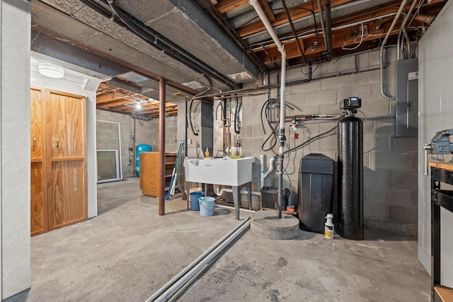 6500 S 121st St, Franklin, WI 53132 - unfinished below grade area with a water softener, electric panel, and a water pressure tank