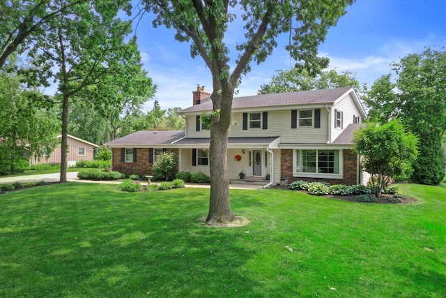 6500 S 121st St, Franklin, WI 53132 - traditional-style house featuring a chimney and a front lawn