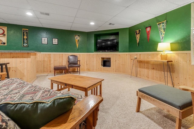 431 Ridgeway Dr, Brillion, WI 54110 - carpeted living area featuring a wainscoted wall, wood walls, a paneled ceiling, and recessed lighting