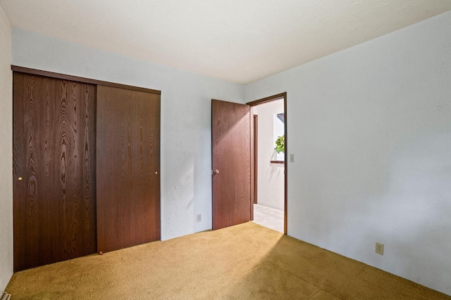 5325 Linden Cir, Racine, WI 53406 - unfurnished bedroom featuring carpet and a closet