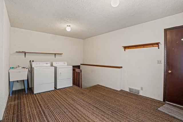 5325 Linden Cir, Racine, WI 53406 - laundry room featuring independent washer and dryer, carpet, and a textured ceiling