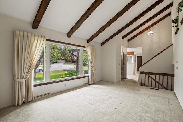 5325 Linden Cir, Racine, WI 53406 - unfurnished living room with carpet, beamed ceiling, and high vaulted ceiling