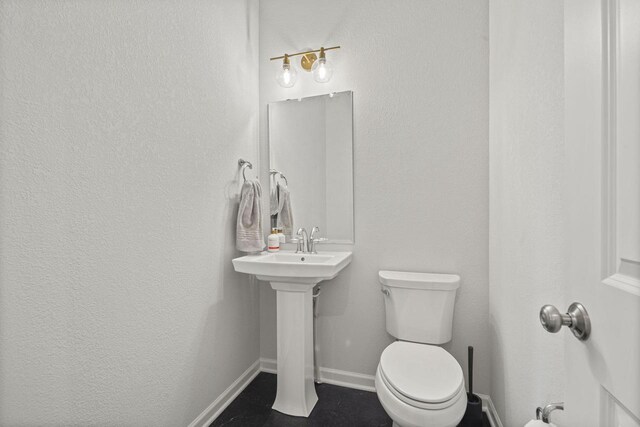 7949 W Oakwood Way, Franklin, WI 53132 - half bathroom featuring toilet and baseboards