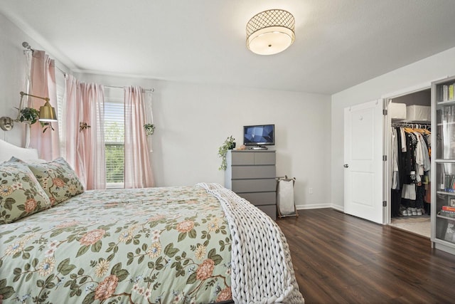 7949 W Oakwood Way, Franklin, WI 53132 - bedroom featuring wood finished floors and a spacious closet