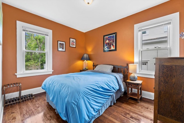 3715 N 2nd St, Milwaukee, WI 53212 - bedroom featuring wood finished floors and baseboards