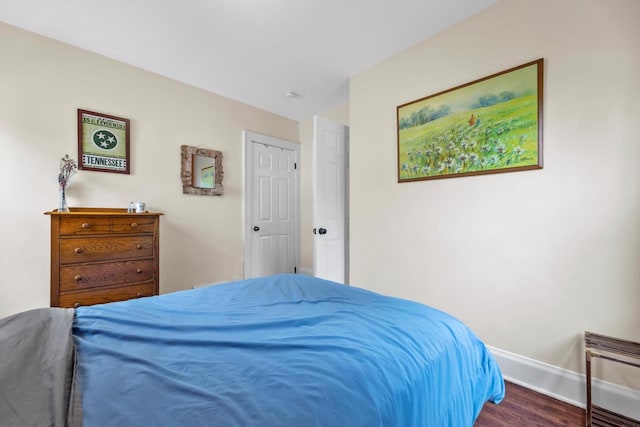 3715 N 2nd St, Milwaukee, WI 53212 - bedroom with baseboards and wood finished floors