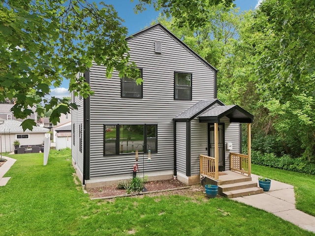 3352 S Adams Ave, Milwaukee, WI 53207 - view of front facade featuring a front lawn