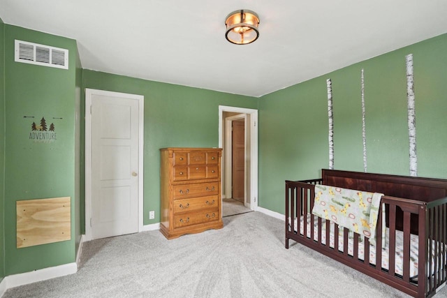 3352 S Adams Ave, Milwaukee, WI 53207 - carpeted bedroom with baseboards and a nursery area