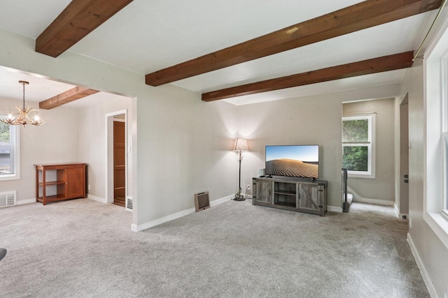 3352 S Adams Ave, Milwaukee, WI 53207 - unfurnished living room featuring beamed ceiling, a chandelier, carpet, and healthy amount of natural light