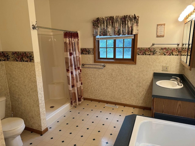 1064 Sunny Ridge Cir, Nekoosa, WI 54457 - full bathroom featuring wainscoting, tile walls, vanity, curtained shower, and tile patterned floors