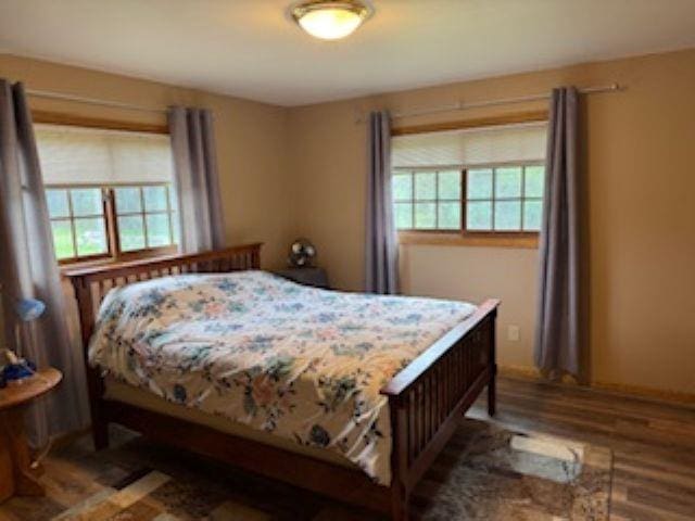 1064 Sunny Ridge Cir, Nekoosa, WI 54457 - bedroom with wood finished floors