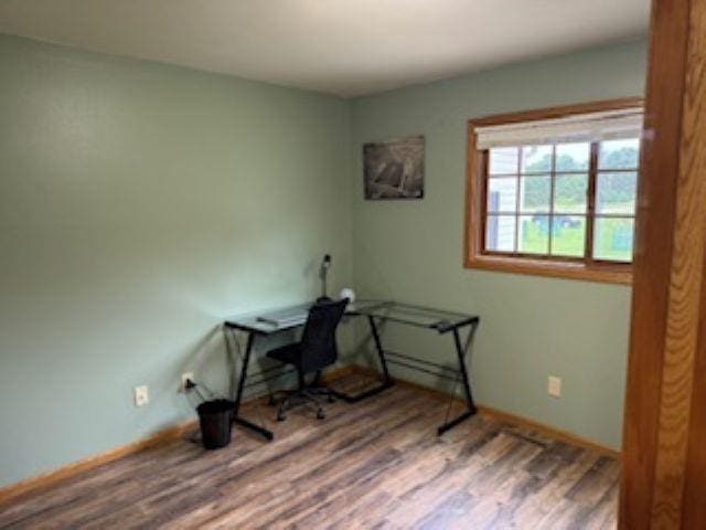 1064 Sunny Ridge Cir, Nekoosa, WI 54457 - home office featuring wood finished floors and baseboards