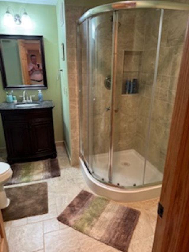 1064 Sunny Ridge Cir, Nekoosa, WI 54457 - bathroom featuring vanity and a stall shower