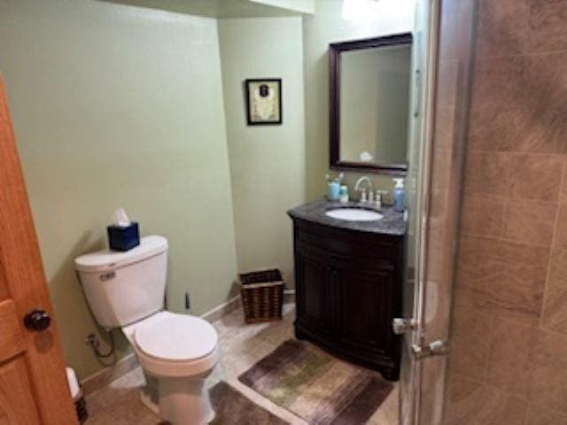 1064 Sunny Ridge Cir, Nekoosa, WI 54457 - bathroom with vanity and a tile shower