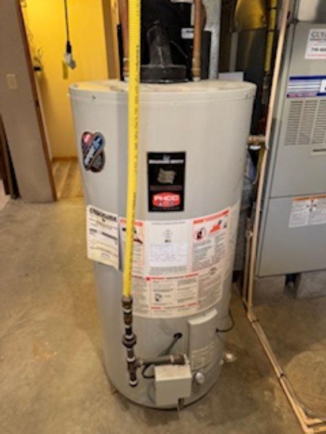 1064 Sunny Ridge Cir, Nekoosa, WI 54457 - utilities featuring water heater and heating unit