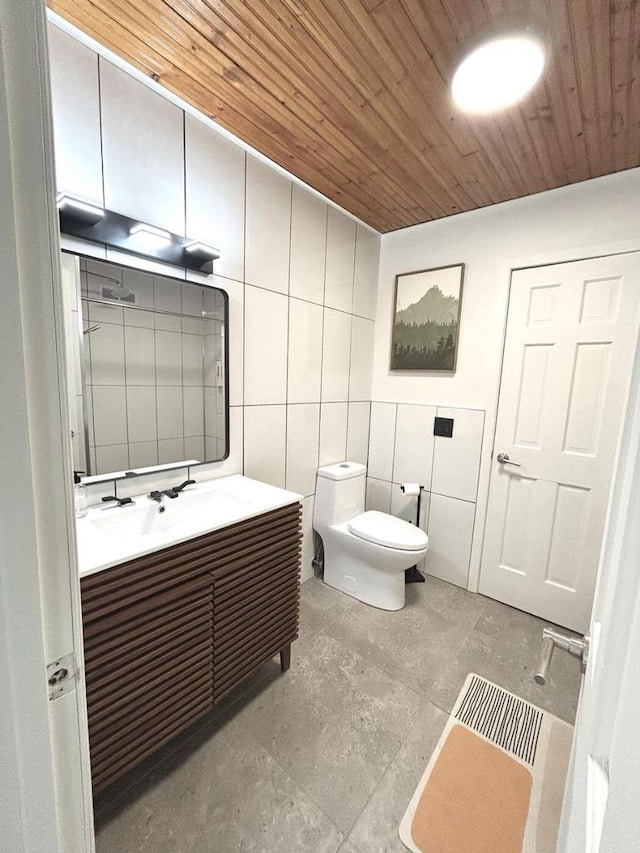 5869 Country Club Rd, Houston, MN 55943 - bathroom featuring tile walls, vanity, and wooden ceiling
