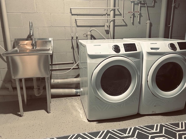 5869 Country Club Rd, Houston, MN 55943 - laundry area featuring concrete block wall and separate washer and dryer