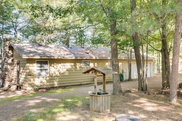 1119 Gross Rd, Woodruff, WI 54568 - back of house with a shingled roof