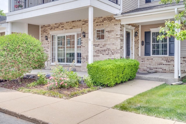 7942 Williamsburg Ct Unit 101, Bristol, WI 53104 - property entrance featuring brick siding and covered porch
