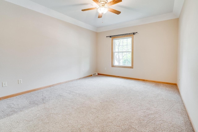 7942 Williamsburg Ct Unit 101, Bristol, WI 53104 - spare room featuring light carpet and a ceiling fan