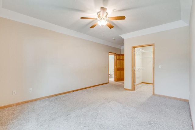 7942 Williamsburg Ct Unit 101, Bristol, WI 53104 - carpeted empty room featuring ceiling fan and baseboards