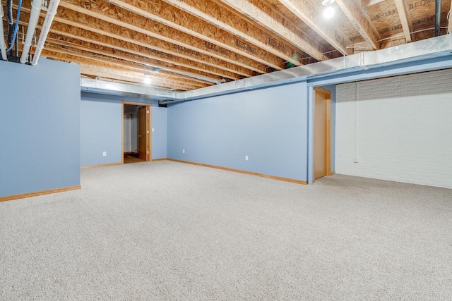 7942 Williamsburg Ct Unit 101, Bristol, WI 53104 - finished basement featuring carpet floors and baseboards