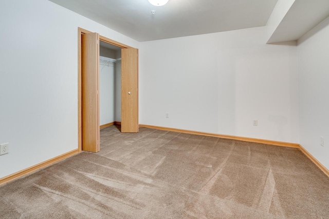 7942 Williamsburg Ct Unit 101, Bristol, WI 53104 - unfurnished bedroom with carpet flooring and a closet