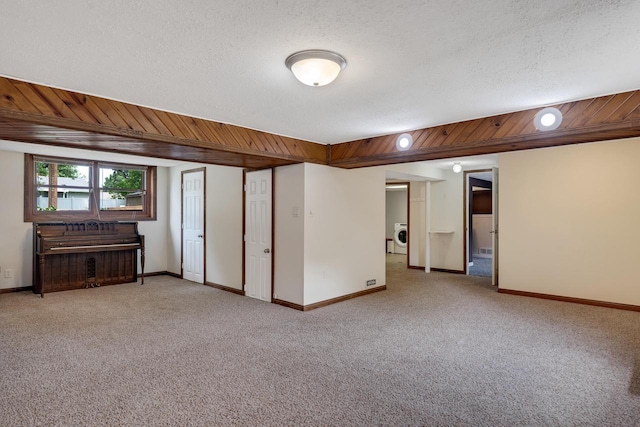 3202 34th St, South Street, La Crosse, WI 54601 - basement with washer / clothes dryer, carpet floors, and a textured ceiling