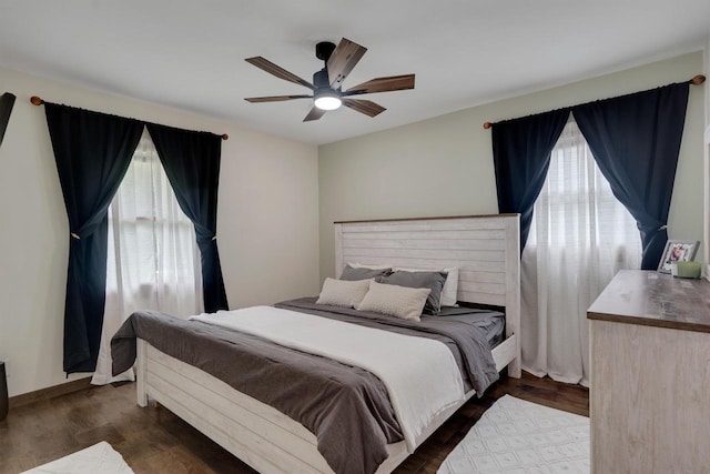 3202 34th St, South Street, La Crosse, WI 54601 - bedroom featuring multiple windows, wood finished floors, and ceiling fan