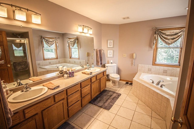 120 Wind Sail Ct, Random Lake, WI 53075 - bathroom with tile patterned flooring, a bath, a shower stall, and double vanity