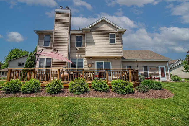 120 Wind Sail Ct, Random Lake, WI 53075 - rear view of property with a chimney, a wooden deck, and a yard