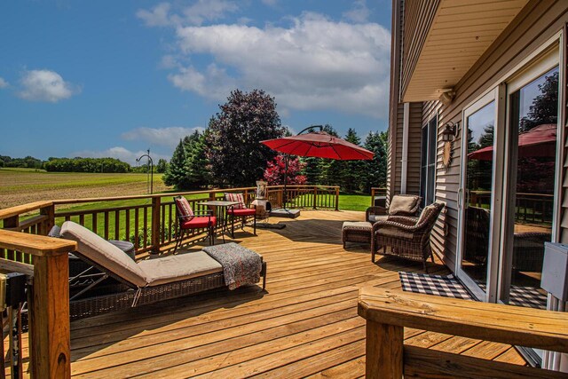 120 Wind Sail Ct, Random Lake, WI 53075 - wooden deck featuring a yard and a rural view
