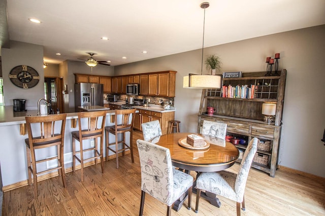 120 Wind Sail Ct, Random Lake, WI 53075 - dining space with light wood-style flooring, recessed lighting, and a ceiling fan