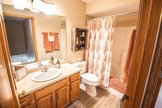 120 Wind Sail Ct, Random Lake, WI 53075 - bathroom with vanity, wood finished floors, and shower / bath combination with curtain